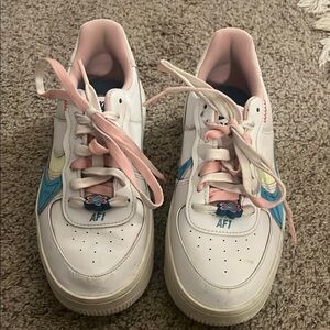 White and Blue Sneakers with Pink Accents
